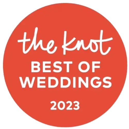 A round orange badge boasts the white text "the knot BEST OF WEDDINGS 2023" centered on it, celebrating top wedding venues in Long Island, NY.